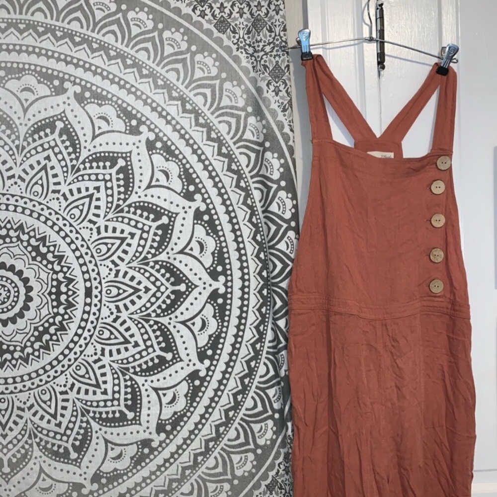 Rust colored overalls